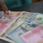 Mayoritas mata uang Asia melemah terhadap dolar AS di tengah meningkatnya permintaan aset safe haven akibat konflik Timur Tengah.(Foto : CNBC Indonesia/Muhammad Sabki)