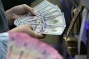 Layar menampilkan pergerakan nilai tukar rupiah terhadap dolar AS yang mengalami pelemahan di tengah penguatan dolar global.(Foto: CNN Indonesia/Adi Ibrahim)
