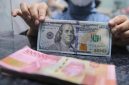 Pergerakan rupiah menguat terhadap dolar AS pada perdagangan terbaru didorong kebijakan Bank Indonesia dan pelemahan dolar global ( Foto : CNBC Indonesia/Faisal Rahman)