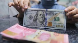 Pergerakan rupiah menguat terhadap dolar AS pada perdagangan terbaru didorong kebijakan Bank Indonesia dan pelemahan dolar global ( Foto : CNBC Indonesia/Faisal Rahman)