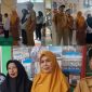 Suasana pengukuran seragam gratis bagi siswa baru TK Negeri Pembina Sungai Penuh, Senin (27/7/2026).