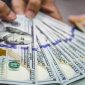 Nilai tukar dolar AS menguat terhadap rupiah usai pengunduran diri Gubernur Bank Indonesia Perry Warjiyo.(Foto: Andhika Prasetia/detikFoto)