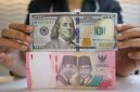 Rupiah menguat terhadap dolar AS pada pembukaan perdagangan akhir Juli(Foto : CNBC Indonesia/Faisal Rahman)


