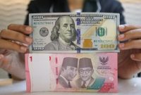 Rupiah menguat terhadap dolar AS pada pembukaan perdagangan akhir Juli(Foto : CNBC Indonesia/Faisal Rahman)

