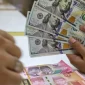 Rupiah melemah terhadap dolar AS.(Foto : Liputan6.com/Angga Yuniar)
