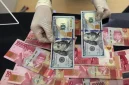 Nilai tukar rupiah menguat tipis terhadap dolar AS pada perdagangan Senin (24/8/2026).(Foto : Liputan6.com/Johan Tallo)