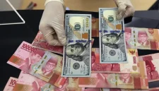Nilai tukar rupiah menguat tipis terhadap dolar AS pada perdagangan Senin (24/8/2026).(Foto : Liputan6.com/Johan Tallo)