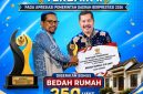 Bupati Kerinci Monadi menerima penghargaan Terbaik II Program 3 Juta Rumah Regional Sumatera di Batam.