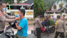 Personel Polres Kerinci dan Polsek Sungai Penuh membagikan masker gratis kepada pengendara, Rabu (26/8/2026).