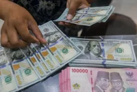 Rupiah diprediksi melemah terhadap dolar AS pada perdagangan Jumat, 14 Agustus 2026.(Foto : Bisnis/Himawan L Nugraha)
