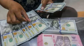 Rupiah diprediksi melemah terhadap dolar AS pada perdagangan Jumat, 14 Agustus 2026.(Foto : Bisnis/Himawan L Nugraha)
