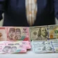 Nilai tukar rupiah menguat 8 poin ke level Rp17.632 per dolar AS pada perdagangan Selasa (8/9/2026).(Foto : Bisnis/Himawan L. Nugraha)