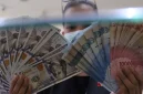 Rupiah kembali melemah terhadap dolar AS pada penutupan perdagangan Senin, 14 September 2026. (Foto : Liputan6.com/Angga Yuniar) 