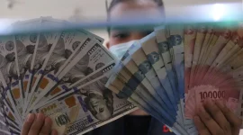Rupiah kembali melemah terhadap dolar AS pada penutupan perdagangan Senin, 14 September 2026. (Foto : Liputan6.com/Angga Yuniar) 