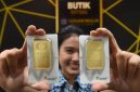 Harga emas Antam hari ini, Minggu (13/9/2026), tetap Rp2.604.000 per gram.(Foto Ilustrasi emas antam/kompas.com)