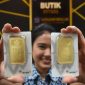 Harga emas Antam hari ini, Minggu (13/9/2026), tetap Rp2.604.000 per gram.(Foto Ilustrasi emas antam/kompas.com)