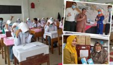 Pembagian  masker kepada siswa SMAN 1 Solsel.