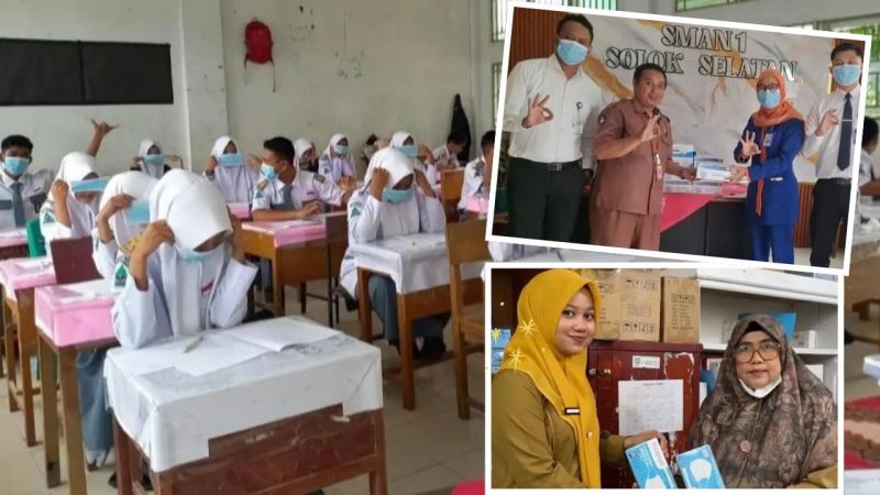 Pembagian  masker kepada siswa SMAN 1 Solsel.