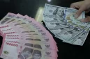 Ilustrasi rupiah dan dolar AS yang menggambarkan pergerakan nilai tukar mata uang.(Foto : The Fed/TRIBUNNEWS/IRWAN RISMAWAN)