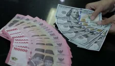 Ilustrasi rupiah dan dolar AS yang menggambarkan pergerakan nilai tukar mata uang.(Foto : The Fed/TRIBUNNEWS/IRWAN RISMAWAN)