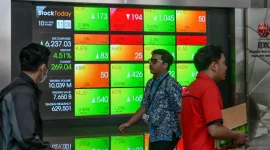 IHSG menguat 4,9% selama perdagangan 19–23 Oktober 2026, dengan TRUK mencatat kenaikan saham tertinggi.(Foto : BAY ISMOYO/AFP)