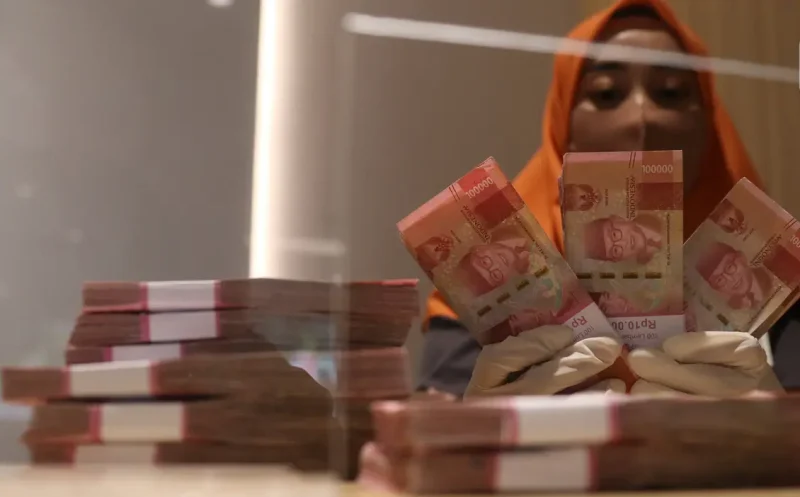 Rupiah menguat ke Rp17.896 per dolar AS pada pembukaan perdagangan Jumat, 9 Oktober 2026.(Foto : Liputan6.com/Angga Yuniar)