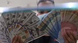  Rupiah melemah ke Rp 18.174 per dolar AS akibat tekanan global dan kenaikan harga minyak dunia. (Foto : Liputan6.com/Angga Yuniar)