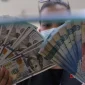  Rupiah melemah ke Rp 18.174 per dolar AS akibat tekanan global dan kenaikan harga minyak dunia. (Foto : Liputan6.com/Angga Yuniar)
