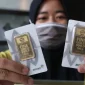 Harga emas Galeri24, Antam, dan UBS di Pegadaian turun pada Jumat (2/10/2026).(Foto : Liputan6.com/Angga Yuniar)