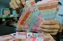 Rupiah melemah ke Rp18.080 per dolar AS pada penutupan perdagangan Jumat (23/10/2026).