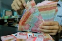 Rupiah melemah ke Rp18.035 per dolar AS seiring tekanan pasar global dan kenaikan harga minyak.(Foto : Liputan6.com/Angga Yuniar)