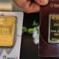 Daftar harga emas Galeri24, Antam, dan UBS di Pegadaian pada Sabtu, 17 Oktober 2026.(Foto : Liputan6.com/Angga Yuniar)