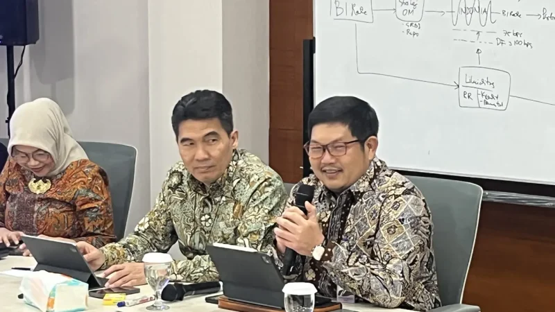Kepala Departemen Pengelolaan Moneter dan Aset Sekuritas BI, Erwin Gunawan Hutapea, dalam Taklimat Media di Kantor BI, Jakarta, Jumat (23/10/2026). (Foto : Liputan6.com/Tian)