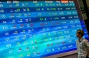 Pengendali WINR menjual 19,25 juta saham untuk meningkatkan free float.(Foto : Ilustrasi IHSG (BAY ISMOYO/AFP)