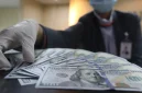 Rupiah menguat ke Rp18.123 per dolar AS setelah investor merespons sinyal dovish The Fed.(Foto : Liputan6.com/Angga Yuniar)