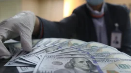 Rupiah menguat ke Rp18.123 per dolar AS setelah investor merespons sinyal dovish The Fed.(Foto : Liputan6.com/Angga Yuniar)