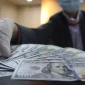 Rupiah menguat ke Rp18.123 per dolar AS setelah investor merespons sinyal dovish The Fed.(Foto : Liputan6.com/Angga Yuniar)