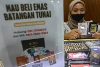 Harga emas Galeri24, Antam, dan UBS di Pegadaian turun pada Jumat (23/10/2026).(Foto : Liputan6.com/Angga Yuniar)