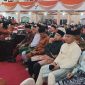 Wawako Sungai Penuh Azhar Hamzah bersama Ketua GOW Mawarti Azhar menghadiri Rapat Paripurna HUT ke-61 Kabupaten Bungo.(foto : Prokopim Kota Sungai Penuh)