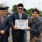 Wakil Ketua I DPRD Kota Sungai Penuh Hardizal bersama Wali Kota Alfin saat menghadiri peringatan Hari Sumpah Pemuda ke-98 di Sungai Penuh.