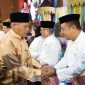Wawako Sungai Penuh Azhar Hamzah bersama Mawarti Azhar menghadiri Rapat Paripurna Hari Jadi ke-27 Kabupaten Muaro Jambi.