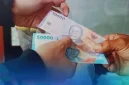 Lembaran uang rupiah digunakan untuk transaksi tunai (Foto:Dokumentasi Bank Indonesia)

