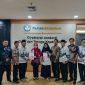 Pengurus FHNK2I dan Forum Komunikasi PPPK berfoto bersama di kantor Direktorat Jenderal Guru dan Tenaga Kependidikan Kemendikdasmen.(Foto dok. FHNK2I for JPNN)