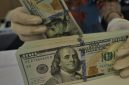 Rupiah melemah 0,25 persen ke level Rp17.948 per dolar AS akibat tekanan inflasi Amerika Serikat.(Foto : CNN Indonesia/Adhi Wicaksono)