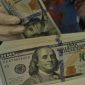 Rupiah melemah 0,25 persen ke level Rp17.948 per dolar AS akibat tekanan inflasi Amerika Serikat.(Foto : CNN Indonesia/Adhi Wicaksono)