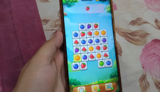 Ilustrasi game susun buah penghasil saldo DANA dengan berbagai tantangan dan hadiah koin.